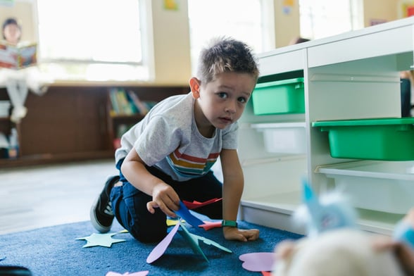 Child playing in daycare center