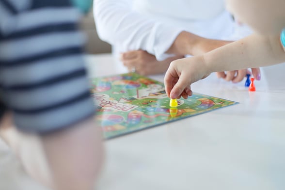 Preschoolers Playing a Board Game